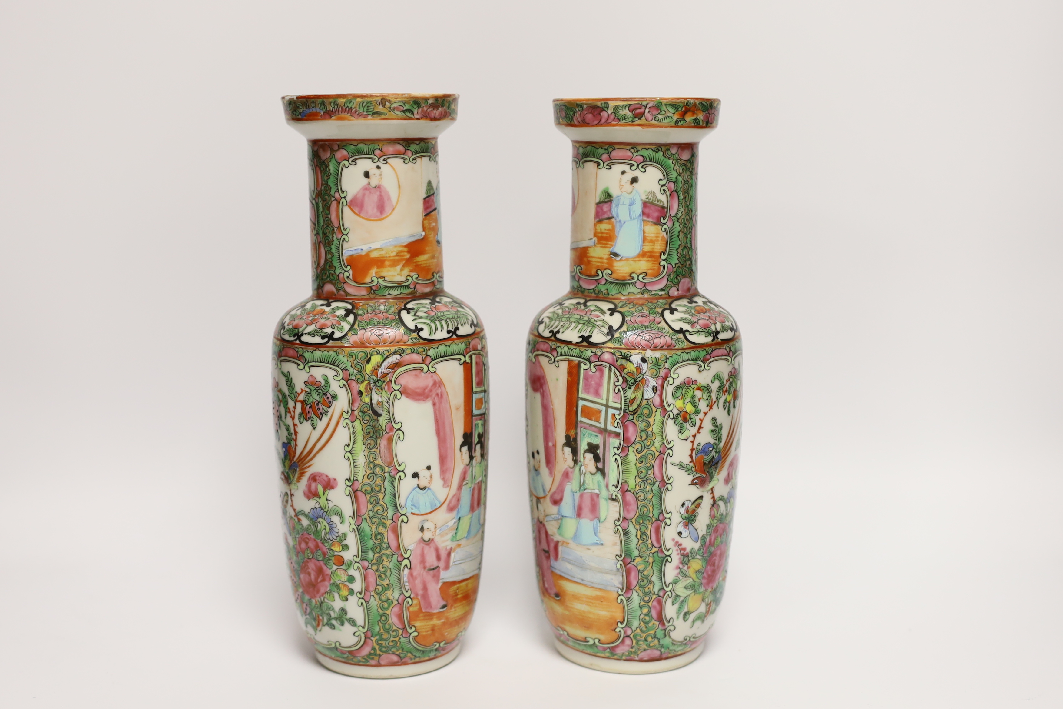 A pair of early 20th century Chinese famille rose vases, 26cm high